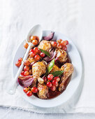 Chicken legs with grapes in a red wine sauce