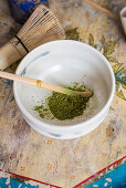 A bowl of matcha tea powder