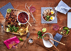 Mexican chicken skewers and oriental noodle soup