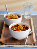 Minestrone in soup bowls
