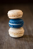 A stack of macaroons filled with salted caramel and vanilla cream