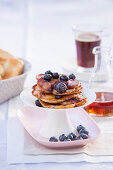 Blueberry pancakes with lemon and maple syrup