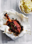 Lamb shank with olives and red wine, served with fennel-celery salad