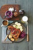 Roast pork with a beer sauce and red cabbage