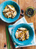 Pork dumplings with corn and ginger stir-fry