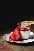 Creamy rice-pudding with rose-poached pears