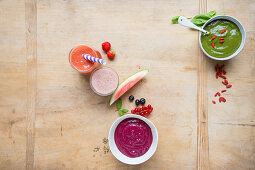 A strawberry smoothie, a summer dream smoothie and a green smoothie bowl