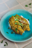 Curry coated fish with basmati rice