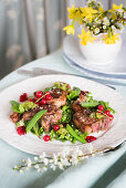 Spring lamb chops with peas, mint and redcurrants