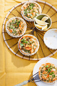 Mini puff pastry quiches with salmon, peas and cress