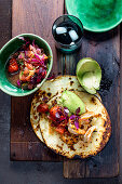 Crispy Tortillas with charred tomato onion salsa and prawns