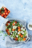 Roasted asparagus with tomato and ricotta