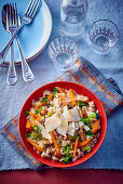 Risotto with seafood, vegetables and Parmesan cheese