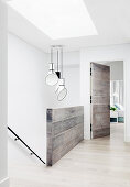 Bright staircase with designer lamps and