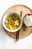 Curried prawns with pineapple and rice
