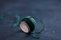 Making tassels: cardboard tube wrapped with thread