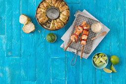 Pull-apart bread and prawn and salmon skewers