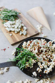Popcorn with gorgonzola, caramel, red pepper and rocket