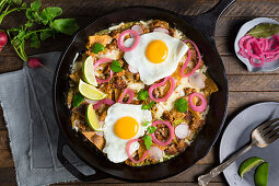 Chilaquiles with salsa verde, chorizo and eggs