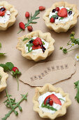 Goat cheese, wild strawberry and rocket tartlets