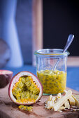 Red passion fruit, halved with white chocolate