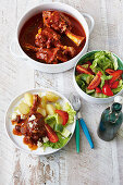 Greek-style braised lamb shanks with lemon and feta cheese