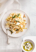 Creamy cauliflower pappardelle with almonds and crispy sauce