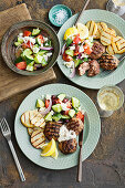 Lemon and oregano rissoles with greek salad