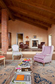 Mediterranean, split-level living room with exposed roof structure