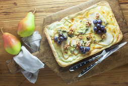 Tarte flambée with pears, blue cheese and walnuts