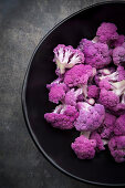 A bowl of organic purple cauliflower