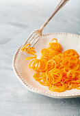 A plate of carrot noodles (low carb)