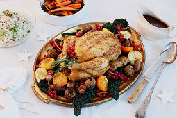 Winter roast chicken with fruit and vegetables