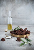 Homemade chocolate truffles with cocoa powder and olive oil