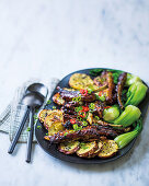 Sticky Asian lamb ribs with sweet potato rounds