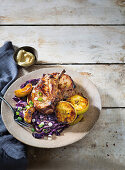 Pork cutlets with braised apple and red cabbage