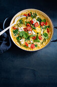 Millet risotto with Pesto and blistered tomatoes