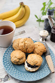 Banana scones with blueberry jam and cream for teatime