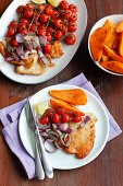 Turkey schnitzel, sweet potatoes and baked tomatoes