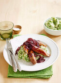 Bangers and Pea mash with red wine gravy