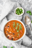 Mexican style vegan beans soup. Made with jalapeno, chipotle, black and white beans and toamtoes