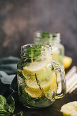 Water flavoured with lemon, lime and mint (detox)