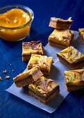 Peanut slices with lemon curd and nut nougat topping