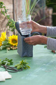 Woman Puts Glass In Felt Bag