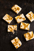 Passionfruit swirl cheesecake slice