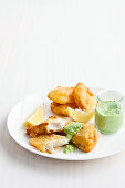 Beer-battered barra and potato scallops with minted pea mayo