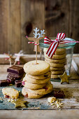 Stack of festive turkish delight biscuits with reindeer decoration as a gift