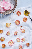 Roasted slices of radishes with honey