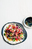 Quinoa slaw with beef and pepper lime dressing
