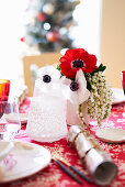 Christmas table decoration with anemone flowers